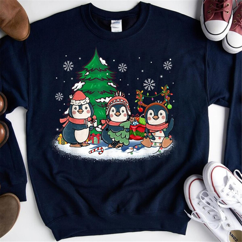 MR-61220231861-christmas-penguin-wearing-reindeer-santa-hat-christmas-tree-image-1.jpg