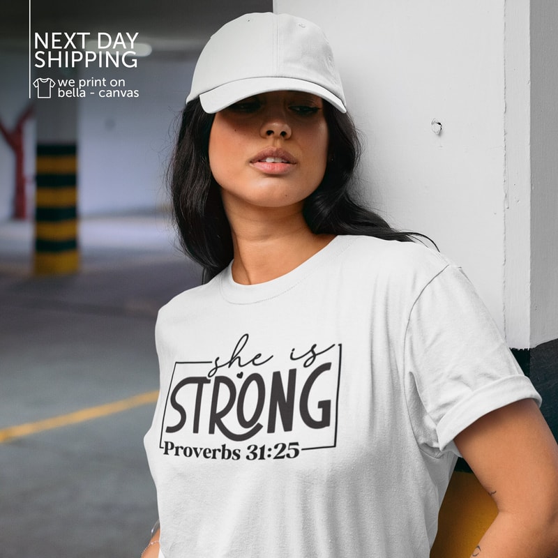 She is Strong Shirt Proverbs 31 25 Tshirt Christian T shirt Strong Women Shirts Mothers Day Gifts Religious Custom Bible Tee MRV1677.jpg