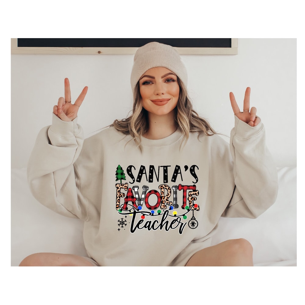 Santa's Favorite Teacher Sweatshirt, Funny Christmas Teacher Sweater, Teacher Long Sleeve Gift, Christmas Hoodie, Christmas Teacher Gift.jpg