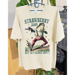 strawberry jams but my glock don&39t shirt, funny meme unisex t shirt sweatshirt hoodie