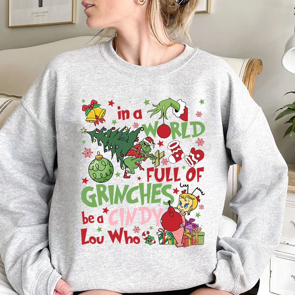 In a World Full of Grinches Be A Cindy Lou Who Christmas Shirt, Funny Grinch Shirt, Cute Shirt, Christmas Sweatshirt, Holiday Gift.jpg