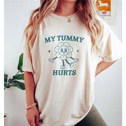 my tummy hurts, tummy ache survivor, meme t shirt, funny t shirt, retro cartoon, vintage cartoon, unisex
