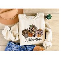 thanksgiving pumpkin sweatshirt, thanksgiving shirt, wild and fall shirt, leopard print pumpkin shirt women's thankful b