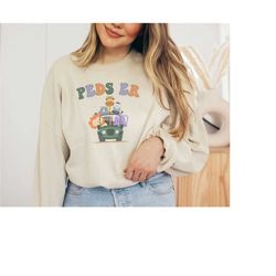 pediatric emergency nurse sweatshirt crewneck peds emergency nurse pedi er crew team pediatric nurse sweatshirt pedi nur