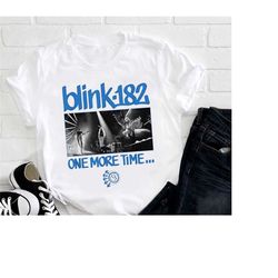 blink smile 182 graphic t-shirt, blink-182 band 2024 world tour shirt, blink one more time tour, blink 182 merch, blink