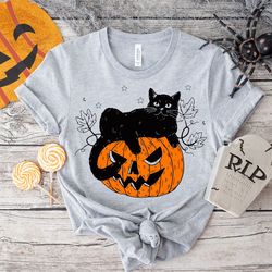 black cat on pumpkin shirt, halloween black cat design, fall shirt, halloween gifts for cat owner,halloween shirt
