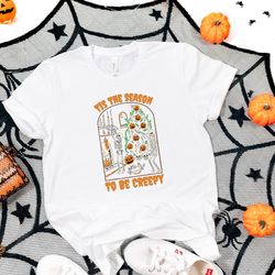 tis the season to be creepy shirt, pumpkin shirt, spooky season shirt, halloween shirt, skeleton shirt, halloween vibes