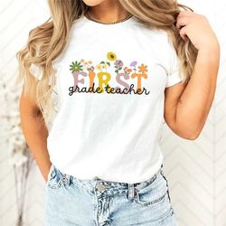 wildflower first grade teacher shirt, elementary school tshirt, teacher comfort colors shirt, teacher crewneck sweatshir