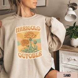 groovy october birth flower sweatshirt, marigold birth month flower sweater, retro birthday floral crewneck, birth month