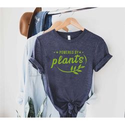 powered by plants shirt, vegetarian shirt, vegetarian gifts, herbivore shirt, herbivore gifts, plant based shirt,plant l