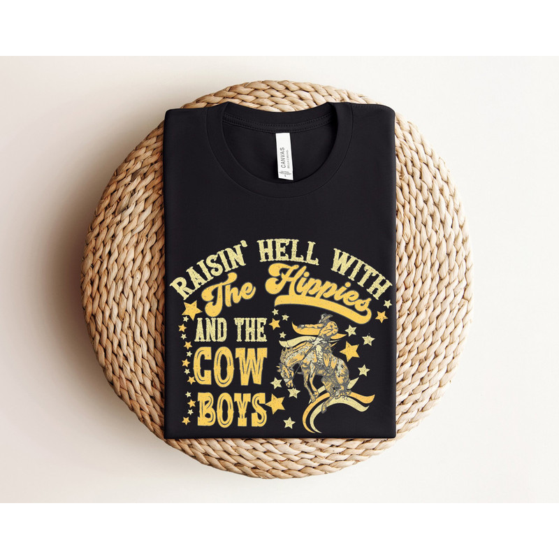 Raisin' Hell With The Hippies And The Cowboys Shirt, Country Cowgirl Shirt, Cowboy Shirt, Cowboy Graphic Shirt, Funny Hippie Shirt, Western.jpg