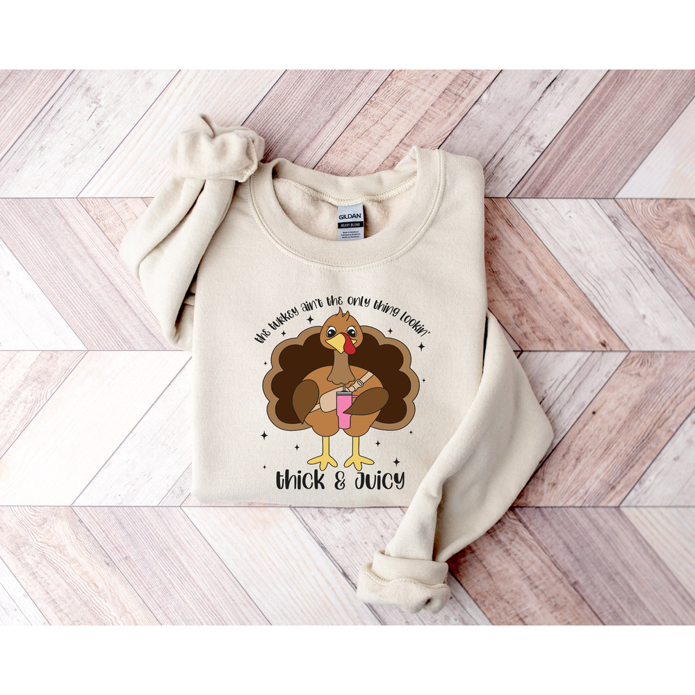 The Turkey Ain't the Only Thing Lookin Thick and Juicy Sweatshirt, Thanksgiving Sweatshirt, Fall Sweatshirt, Funny Thanksgiving Sweatshirts.jpg
