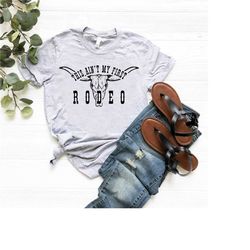 rodeo tshirt,cowgirl shirt,this ain't my first rodeo shirt,western shirt,country girl tee,cowboy shirt,farm girl tee,tex
