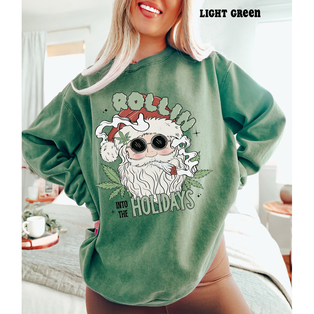 Retro Santa Comfort ColorsĀ® Christmas Weed Sweatshirt, Rollin Into the Holidays Funny Cannabis Hoodie, Marijuana Holiday Party Apparel.jpg
