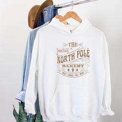 north pole bakery hooded sweatshirt, cute, christmas hoodie, baking team hoodie