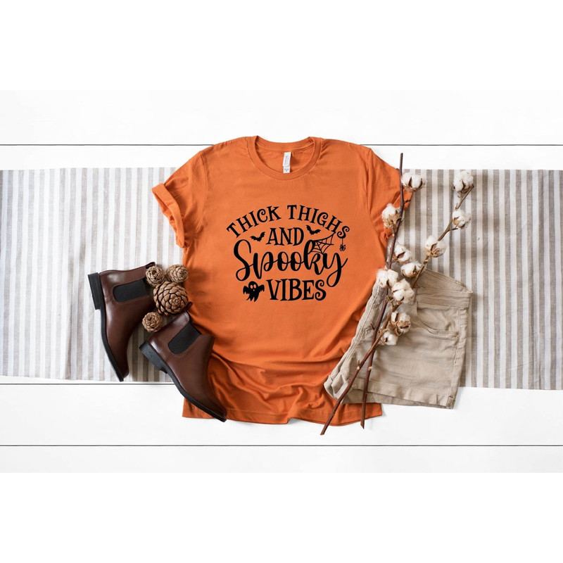 Thick Thighs And Spooky Vibes - Halloween Shirt, Halloween Shirts, Halloween T-Shirt, Halloween Tee, Halloween Tees, Funny Halloween Shirt.jpg