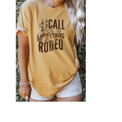 comfort colors retro western life country cowgirl tshirt gifts for rodeo mom, and they call the thing rodeo shirt, vinta