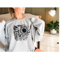 floral rib cage crewneck sweatshirt, spooky skeleton sweatshirt, gothic witchy stuff, dark cottagecore sweater, botanica