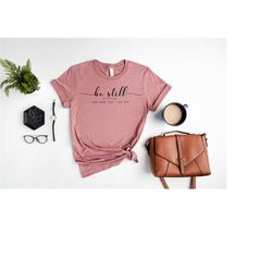 be still and know that i am god shirt, christian t-shirt, religious gifts, religious shirts for women, faith shirts, bib