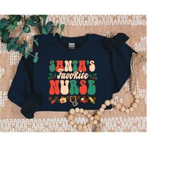 santa favorite nurse sweatshirt, christmas nurse sweatshirt, gift for nurse sweater, rn nurse shirt, funny christmas nur