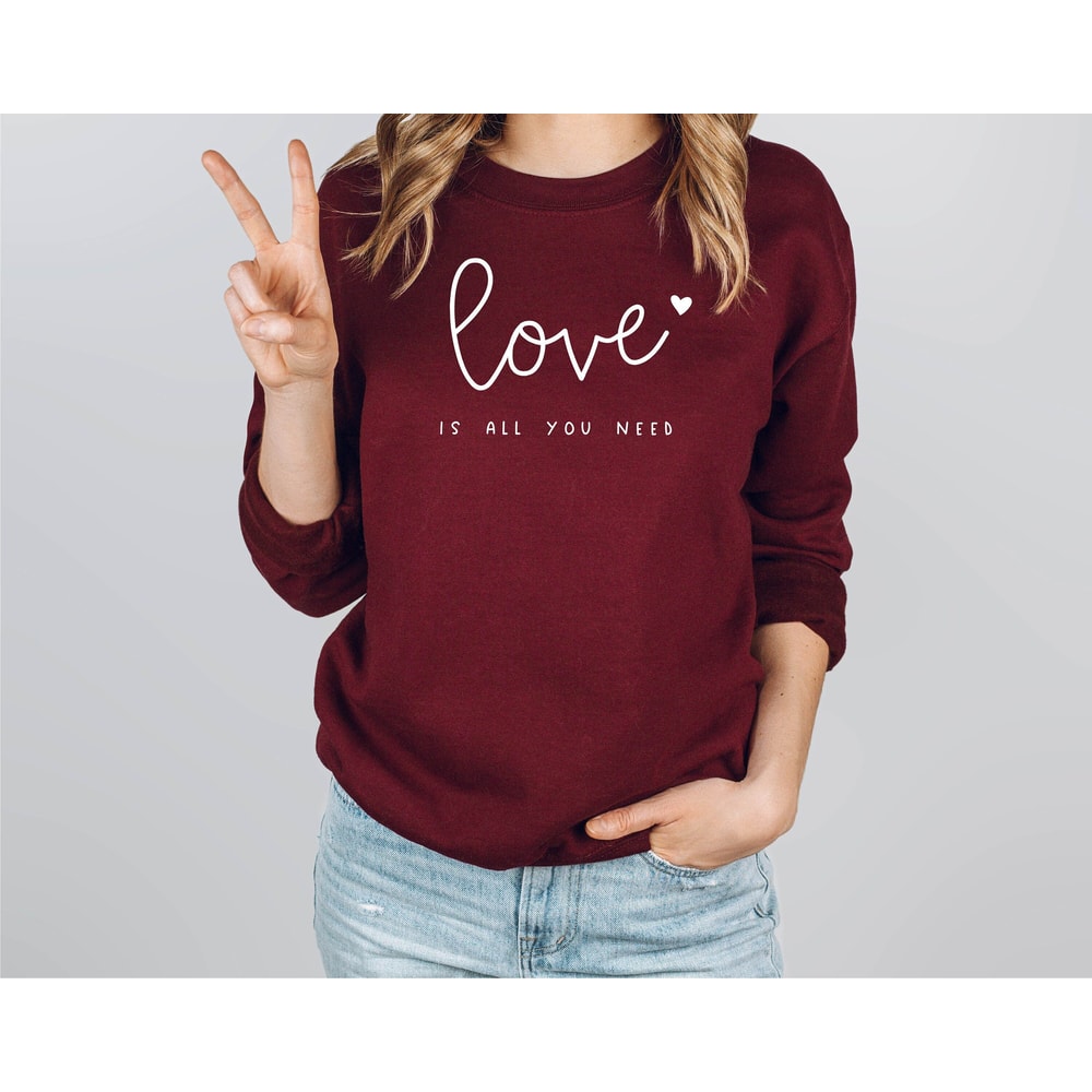 Love is all you need Sweatshirt Love sweatshirt Valentines Day Heart sweatshirt Valentines Day Gift Cute Valentine's Day Sweatshirt.jpg