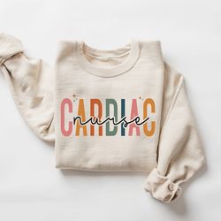 cardiac nurse sweatshirt, cardiovascular nurse gift, cute cardiology nursing sweater, school grad, cardiac care nurse sw