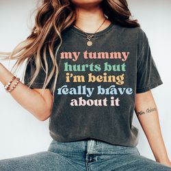 my tummy hurts but im really being brave about it t-shirt, funny bravery tee, chronic illness t-shirt, healthy living sh