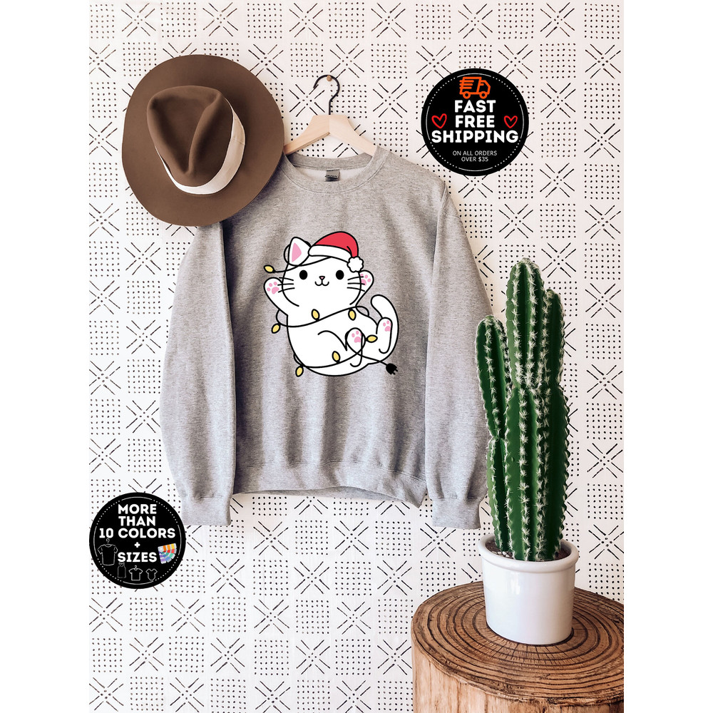 Christmas Kitty Sweatshirt, Cute Christmas sweater, Cat Mom Shirt, Cat Lover Gift, Womens Christmas Pajamas, Cat Owner Tee, Christmas Tshirt.jpg