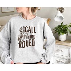 retro western life country cowgirl crewneck sweatshirt gifts for rodeo mom, and they call the thing rodeo shirt, vintage