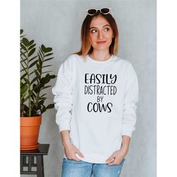 easily distracted by cows sweatshirt, funny cow sweatshirt, farming sweatshirt, dairy farm sweatshirt, funny farmer gift