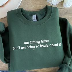 my tummy hurts but im being really brave about it, tummy ache survivor, ibs funny sweatshirts, funny gift ideas