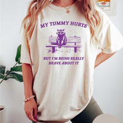 my tummy hurts, raccoon t shirt