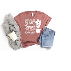 teacher plant seeds that grown forever shirt, inspirational teacher shirt, teacher life shirt, teacher back to school te