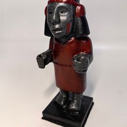 aztec chalchiuhtlicue statue, primitive tribal craft, realistic museum replica of real ancient artifact
