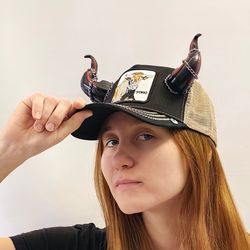 baseball cap with devil horns, with black and red bull horns for halloween, photoshoot, realistic fantasy cosplay horns