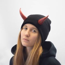 black beanie with red devil horns, slouchy fisherman-style beanie with bull horns for halloween, photoshoot, realistic f