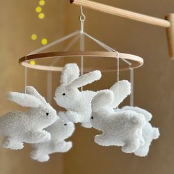 bunny mobile crib. nursery cozy decor. rabbits mobile cot.