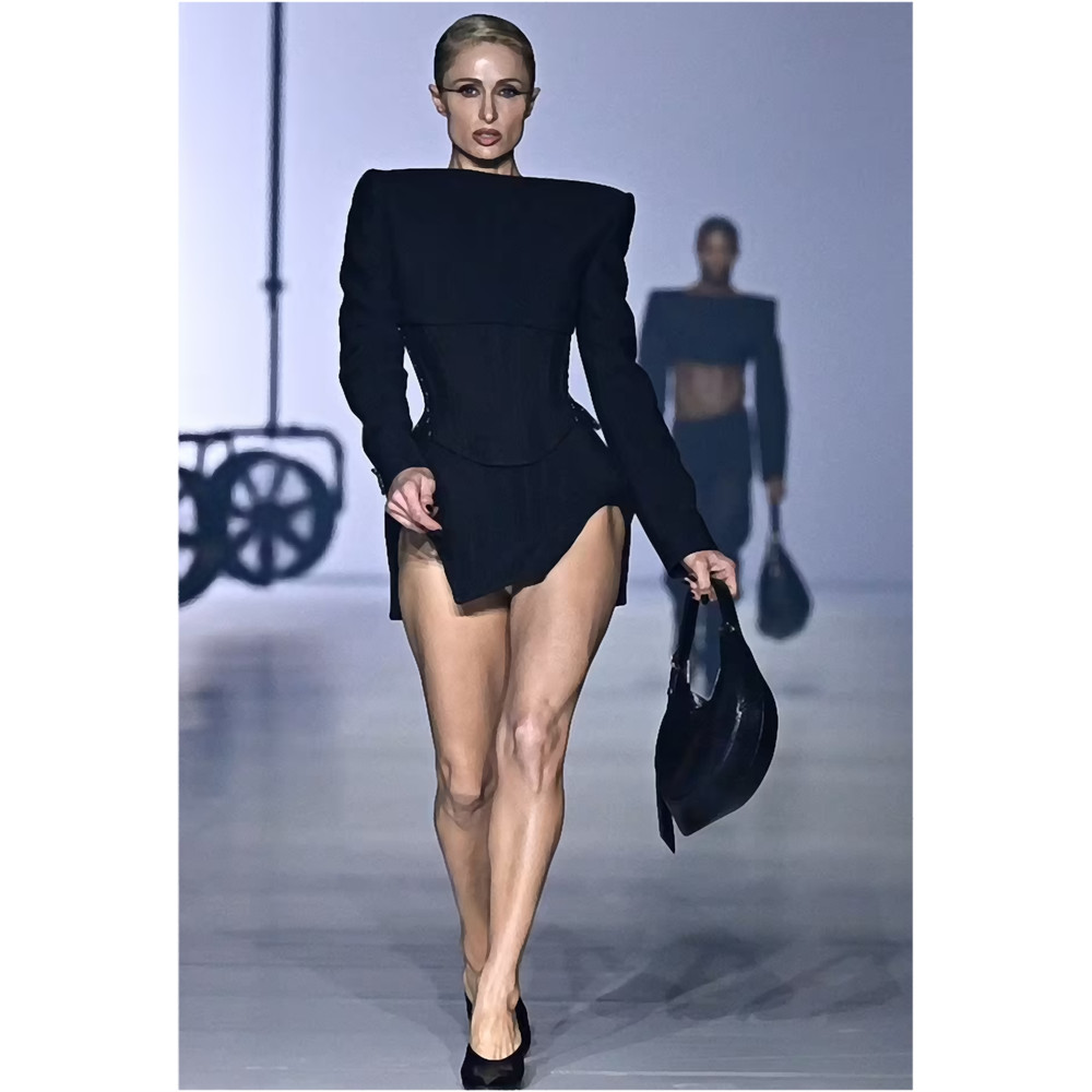 Paris Hilton puts on a VERY leggy display.png