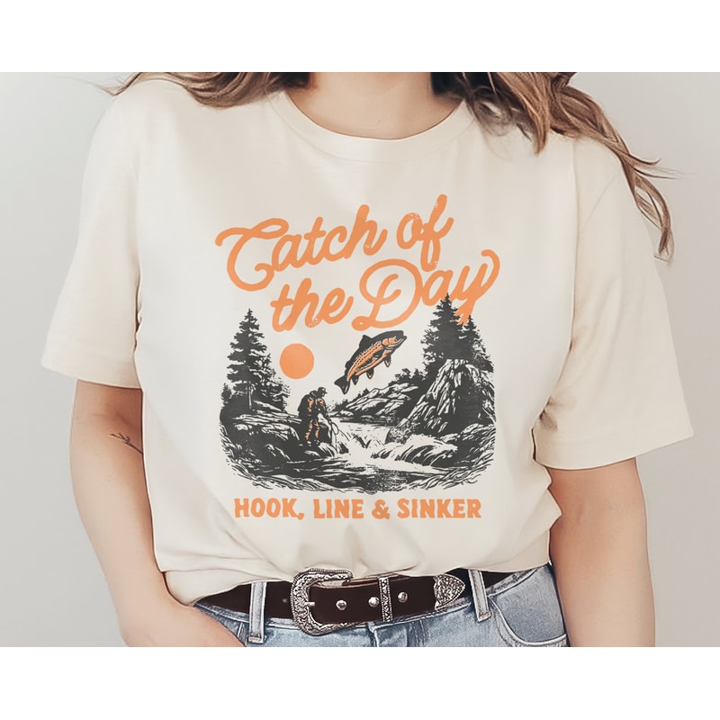 Catch of the Day Graphic T-Shirt, Country Lake Fisherman, Fish, Southern Western Cowboy, Phrase & Saying, Retro Vintage, Women's Tee.jpg