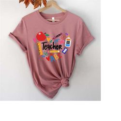 teacher heart t-shirt, teacher school supplies shirt, funny teacher shirt, school supply shirt, kindergarten teacher shi