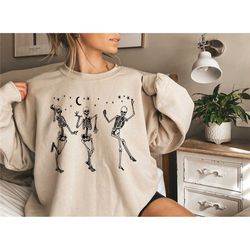 halloween party dancing skeleton shirt,skeletons happy halloween tshirt,oversized