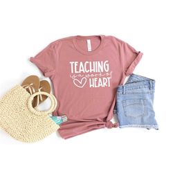 teaching is a work of heart shirt, back