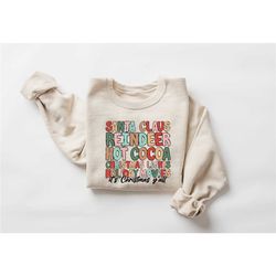 santa claus reindeer hot cocoa christmas lights holiday