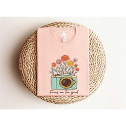 focus on good shirts, retro camera shirt, flower