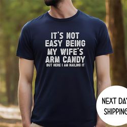 funny husband shirt from wife, it's not easy being my wife arm candy, husband gift shirt, husband birthday, dad joke shi