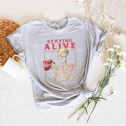 staying alive shirt, trendy coffee shirt, skull tshirt for women,funny skeleton t-shirt,coffee lovers gift,funny coffee