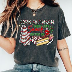 torn between looking like a snack or eating one tshirt,