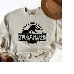 teaching is a walk in the park shirt, saurus tee, kindergarten teacher tee, gift for teacher, funny teacher sweatshirt,t