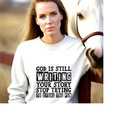 god is still writing your story shirt,belif in god shirt,belief quote shirts,church group shirts,best faith sweatshirt,c