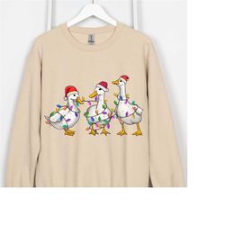 ducks christmas light sweatshirt,santa ducksmerry christmas shirt,duck lover tee,funny duck christmas sweatshirt,christm